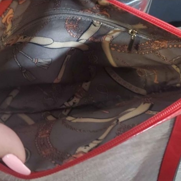 Clear bag with red trim, perfect for stadium use. - Picture 5 of 6